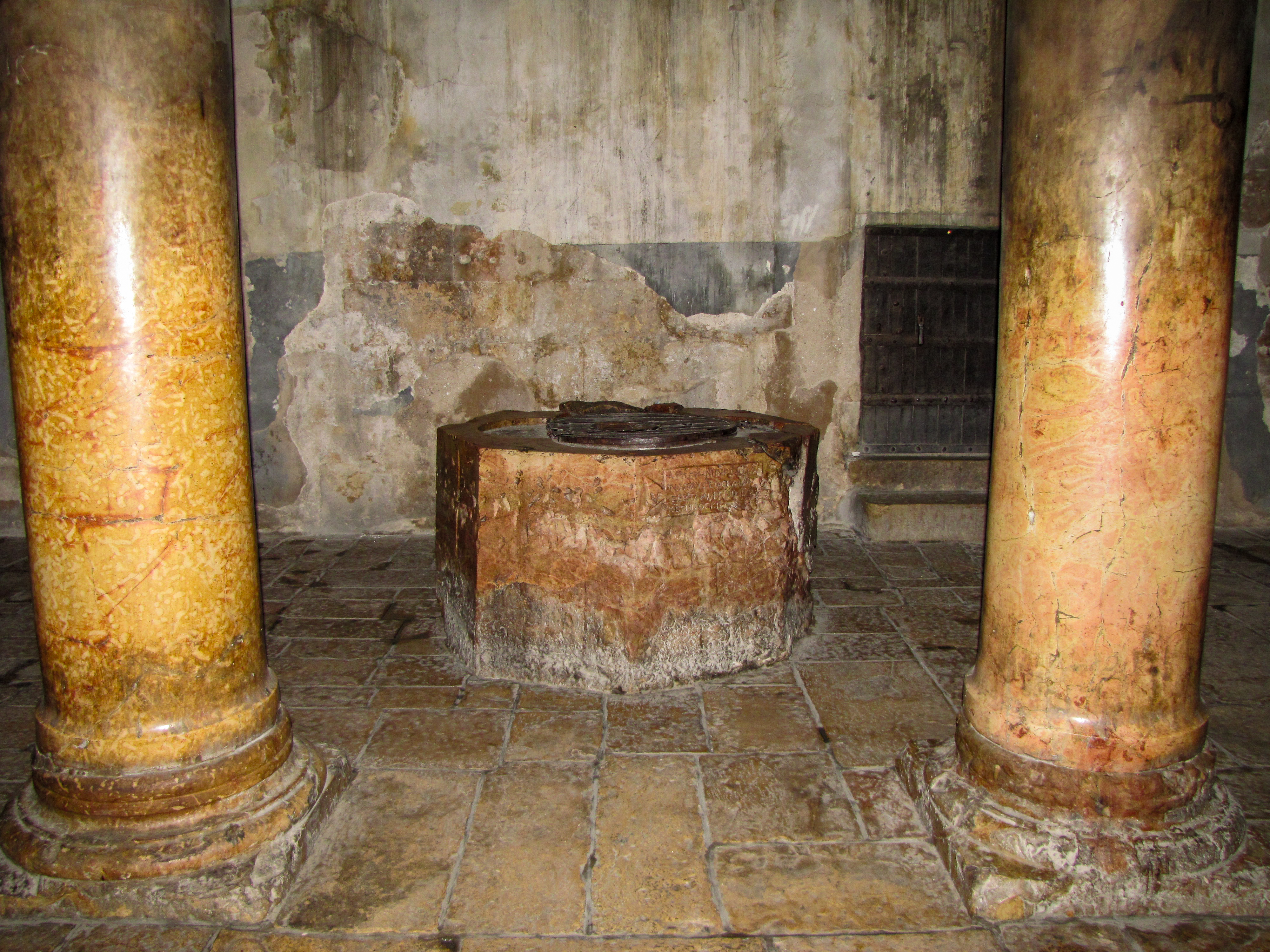 Baptismal Font with Marble Pillars in Church of the Nativity